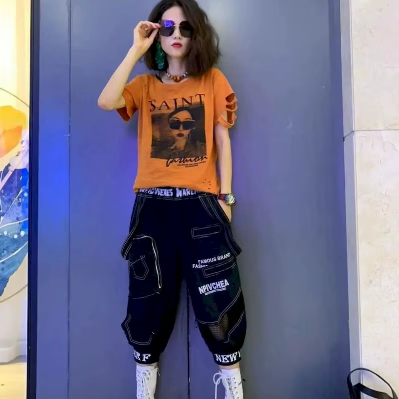 T-shirt en coton imprimé à motif d'oeil pour femmes, manches courtes, design de mode, tendance d'été