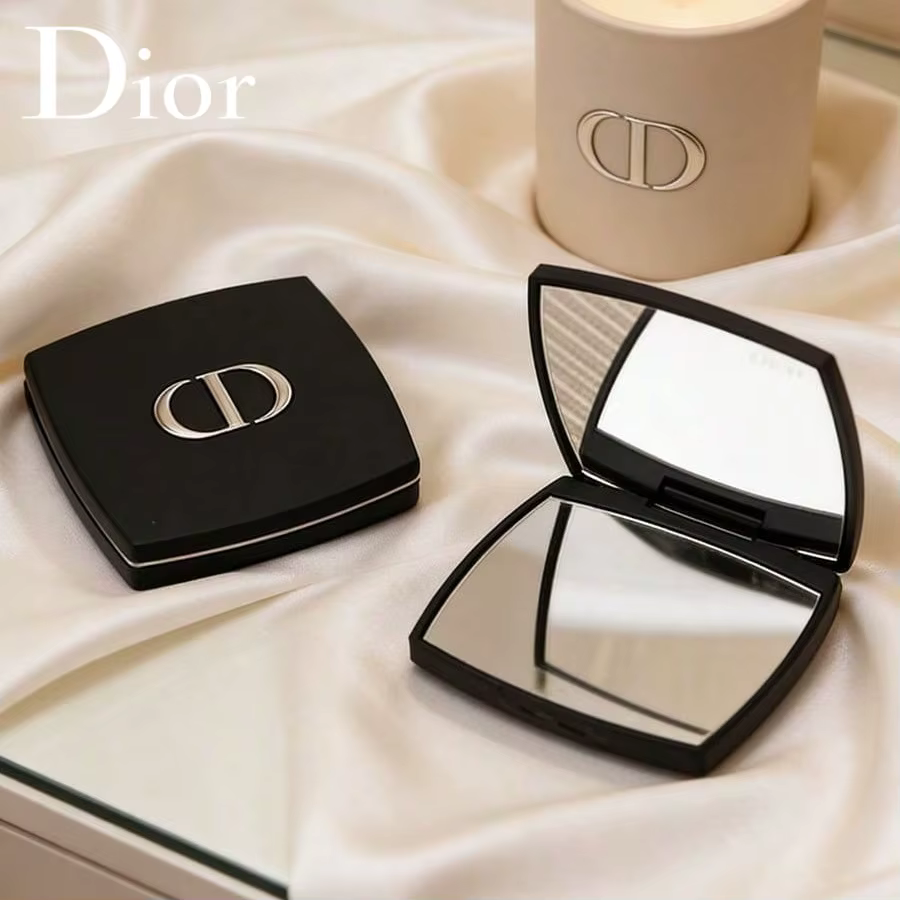 Miroir de maquillage double face portable noir élégant et luxueux Christian Dior avec logo de la mar