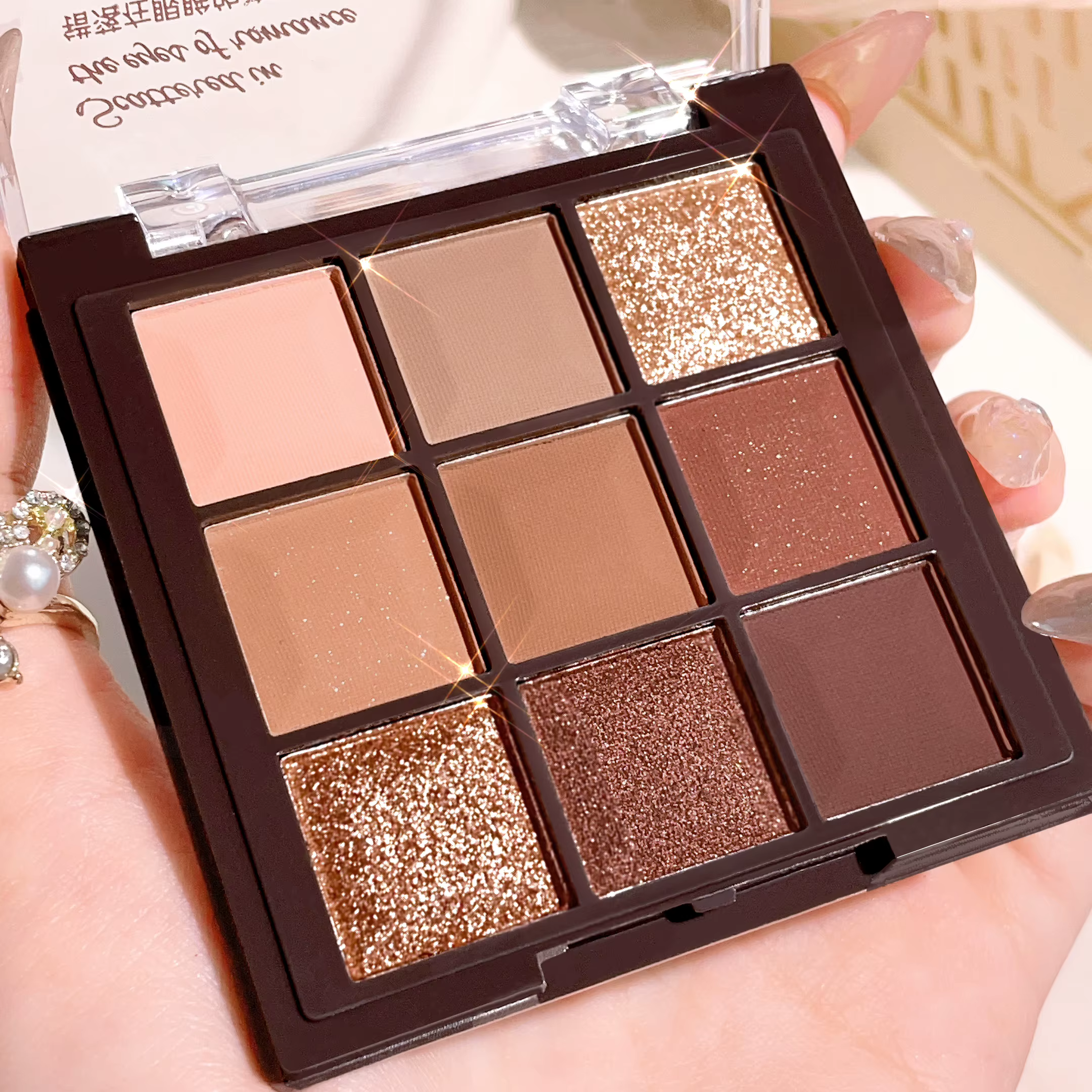Palette de fards à paupières chocolat 9 couleurs avec brillance nacrée, paillettes fines, tons mats