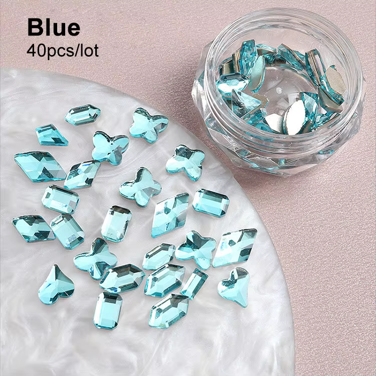 Strass en cristal astronomique plat en forme de breloques pour Nail Art, fournitures de décoration, accessoires professionnels, mélange de 40 pièces/lot, N64.Accesorios