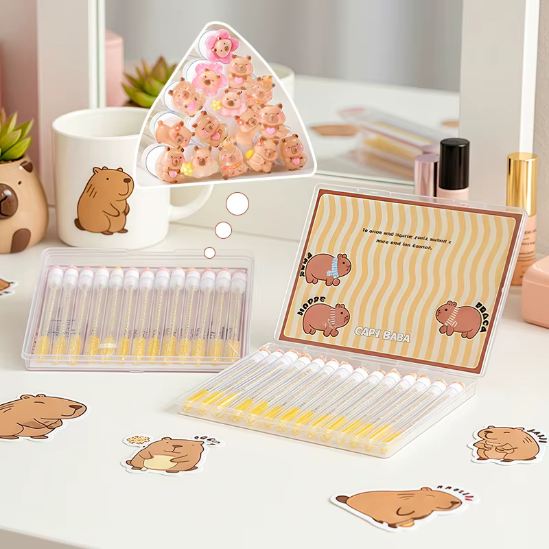 Paquet de 14 pinceaux à mascara Capybara dans une boîte cadeau. Chaque tête de brosse est emballée individuellement