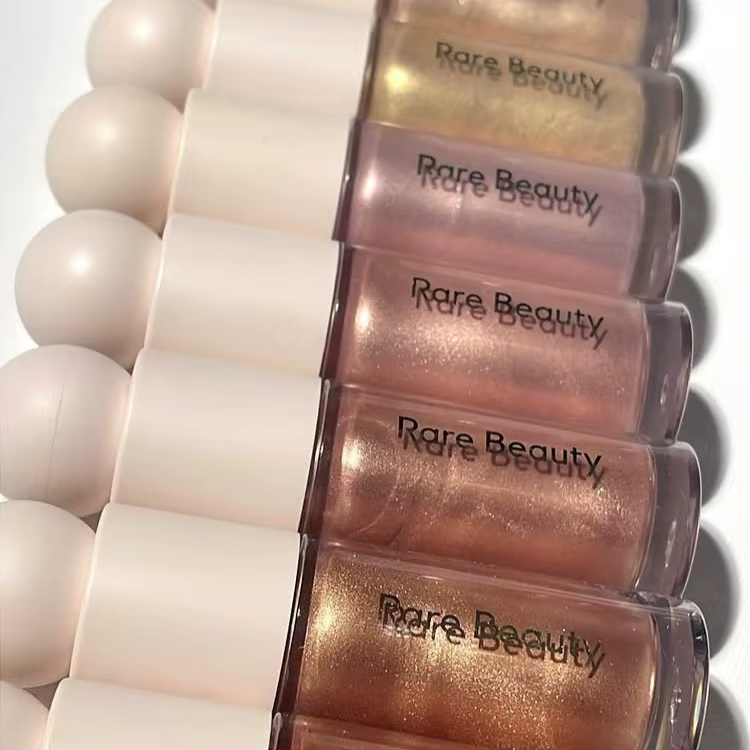 Rare Beauty Enlumineur Liquide Scintillant Longue Tenue Imperméable Éclat Naturel Visage Corps Cosmétique Mélangeable pour Quotidien et Soirées