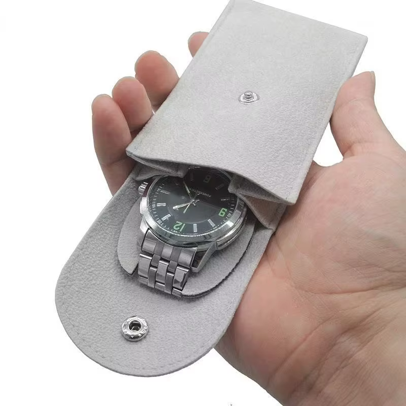 Sac de rangement pour montres en velours, doublure douce anti-rayures, fermeture à pression pour une protection quotidienne en voyage
