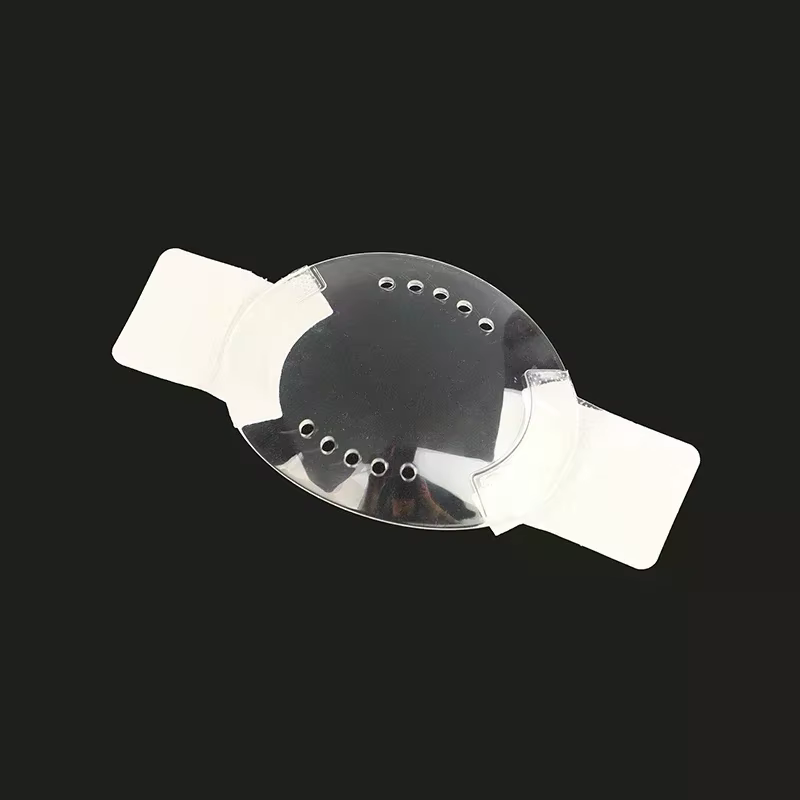 Bouclier oculaire auto-adhésif en plastique transparent