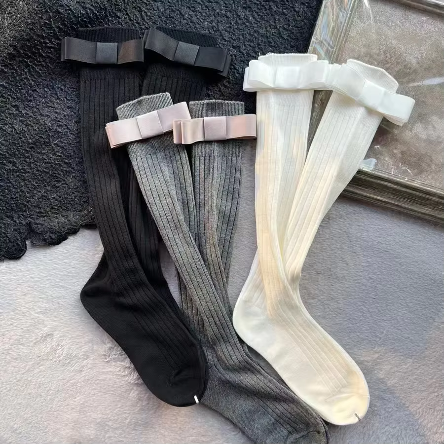 Chaussettes pour femmes, tendances printemps-été, style décontracté et preppy, chaussettes hautes jusqu'au genou, en coton HQ, couleur unie, avec nœud, chaussettes longues confortables