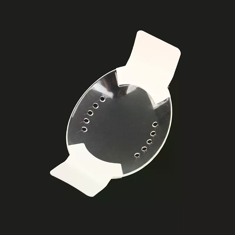 Bouclier oculaire auto-adhésif en plastique transparent