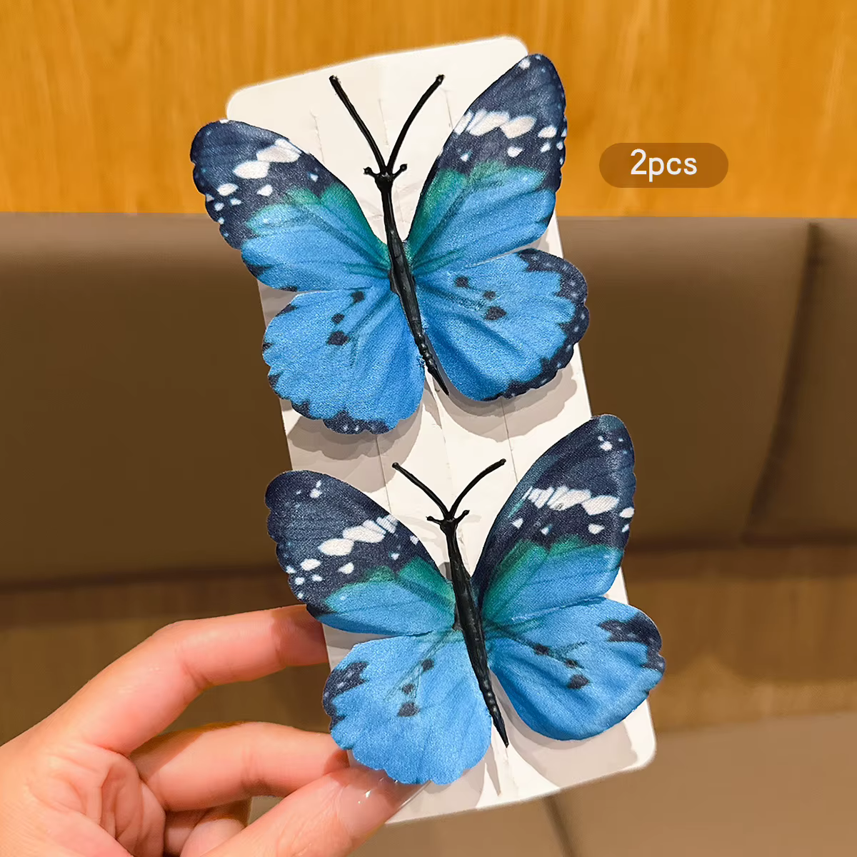 2 pinces à cheveux papillon fée bleu eau adaptées aux accessoires