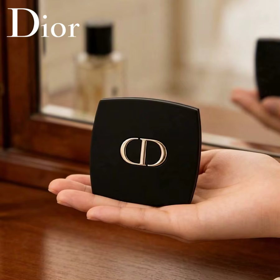 Miroir de maquillage double face portable noir élégant et luxueux Christian Dior avec logo de la marque CD