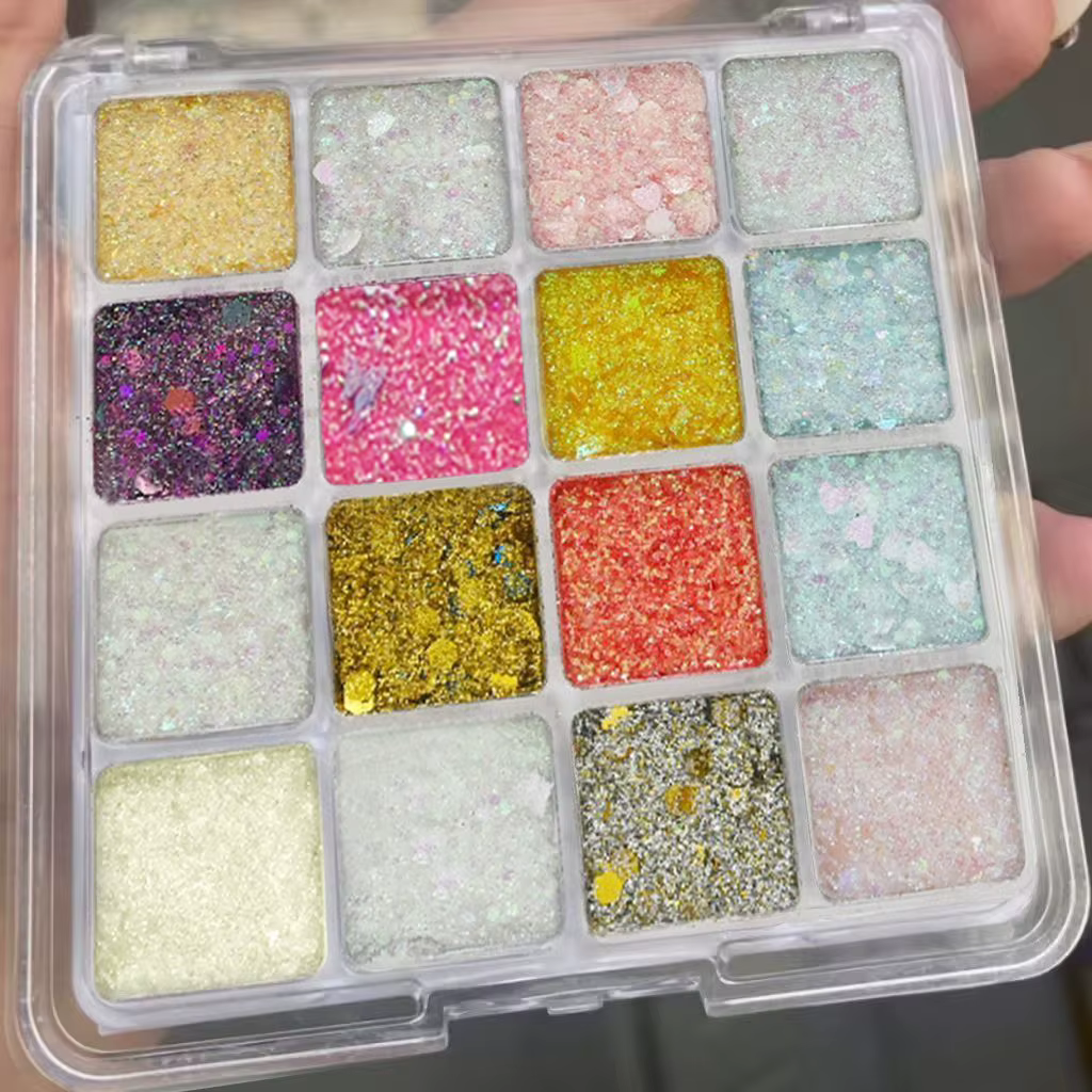 Palette de fards à paupières magiques scintillants de seize couleurs