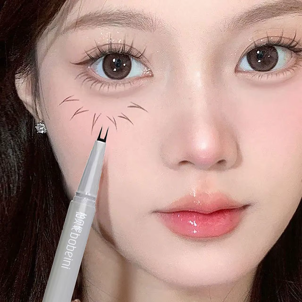 Eyeliner à Double griffe